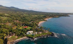 Aerial view of a Hawaii coastal home and shoreline for property survey planning
